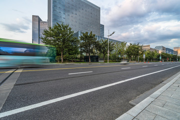 modern architecture, motion blur car at dusk