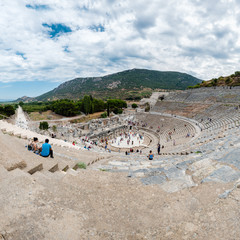 People visit Amphitheatre (Coliseum) at Ephesus historical ancient city, in Selcuk.High Resolution panoramic view.Izmir,Turkey:20 August 2017