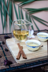 Teapot with two cups for green tea on the table. Tea ceremony