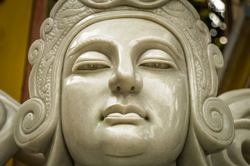 Close up face of the statue of the Chinese warrior marble.