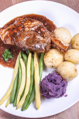 plate with meat and vegetables