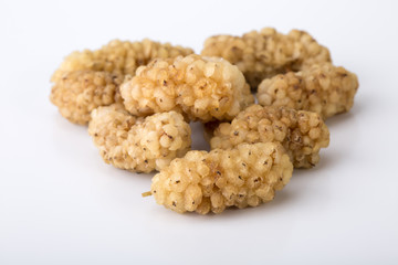 Close Up Shot Of Dried White Mulberries Fruits Isolated On White Background, A Healthy And Popular Sweet Snacks In Iran And Turkey