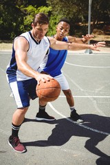 Player practicing basketball