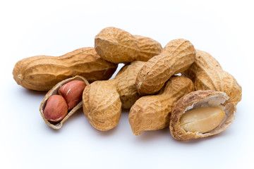 Dried peanuts on the white background.