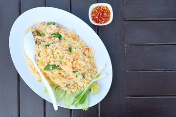 Fried rice in white dish.