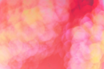 Red, pink and yellow abstract bokeh background, shallow depth of field