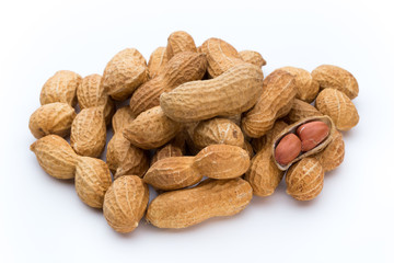 Dried peanuts on the white background.