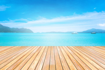 Fototapeta premium wooden terrace with Sand beach and tropical sea.