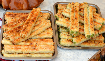 Puff pastry with filling. Rollini with brynza cheese and spinach