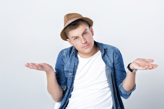 handsome man in denim with hat