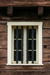 Obraz na płótnie Canvas old window with metal fence