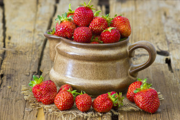fresh strawberries in a pot