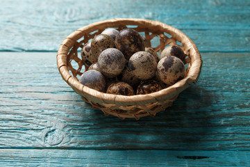 Picture of blue surface with quail eggs