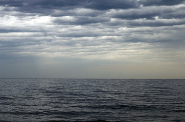 Sea and cloudy sky
