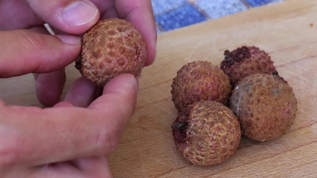 Peeling Lychee Fruit.