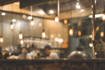 Abstract blurred bokeh (defocused) restaurant, cafe, bar, pub, nightclub, coffee shop or pizzeria background. Basic background for design. - obrazy, fototapety, plakaty