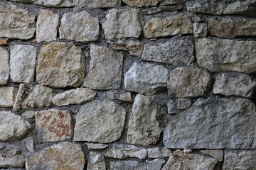 Large rough natural stone wall seamless texture for design background