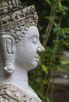 close up face on buddha head statue