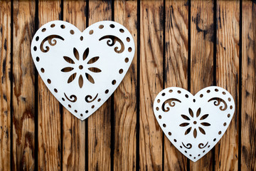wooden planks background with heart shape decoration, vertical