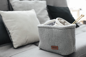 Knitting and cushions on the sofa