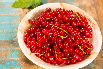 Fresh ripe red currant berries on the table