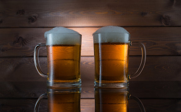 Two glasses of golden beer
