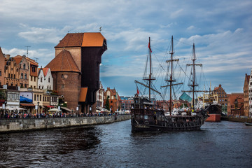 Fototapeta na wymiar Old town and ship on Motlawa river in Gdansk, Pomorze, Poland