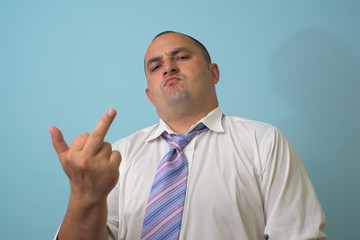 businessman showing the middle finger