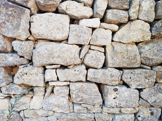 gray wall of stones background texture