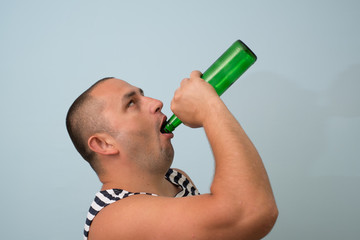 happy man drinks beer