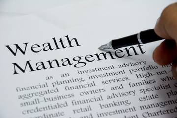 wealth management text of business concept background © prakasitlalao