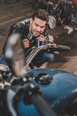 Fototapeta na wymiar biker with classic motorcycle