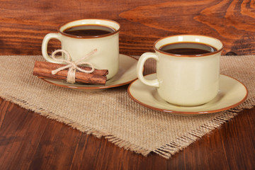 black coffee in ceramic cup with vanilla and free space for text