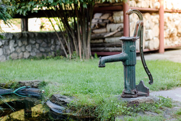 Fototapeta na wymiar vintage water pump