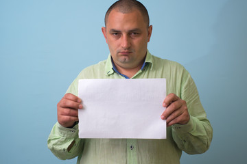 Man with a piece of paper