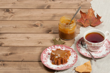 Homebaked Cake, Maple Leaf Shape. Cup Of Tea. Toffee Sauce. Top View.