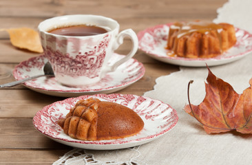 Homebaked Cake, Acorn Shape. Cup Of Tea. Toffee Sauce.