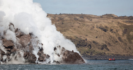 watching Snow volcano activity, Chirpoy Island, Russia
