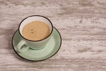 green cup of coffee