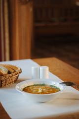 Nice vegetable soup at the table of restaurant.