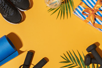 sport gift box and fitness equipment  . bright background