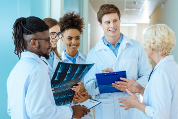 medical interns listening to teacher