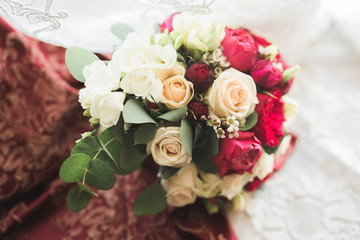 Wonderful luxury wedding bouquet of different flowers