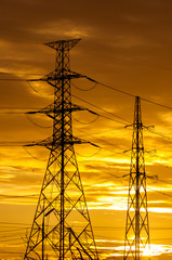 High voltage post.High-voltage tower sky at sunset