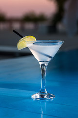 Special cocktail from the barman. Pouring alcohol to cocktail glass.