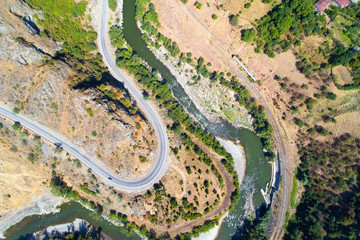 View from above on the river and the road of Georgia. © Alexander