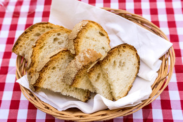 bread in basket - little roll breads in basket on table