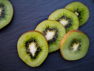 kiwi fruit on a dark background