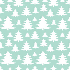 Obraz premium White Christmas trees on blue background pattern