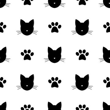 Cat head and paw prints seamless pattern